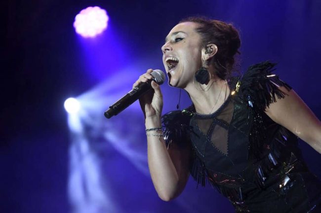 ZAZ Booking - Artist Relations Stefan Lohmann, ZAZ Live on Stage Blue background 